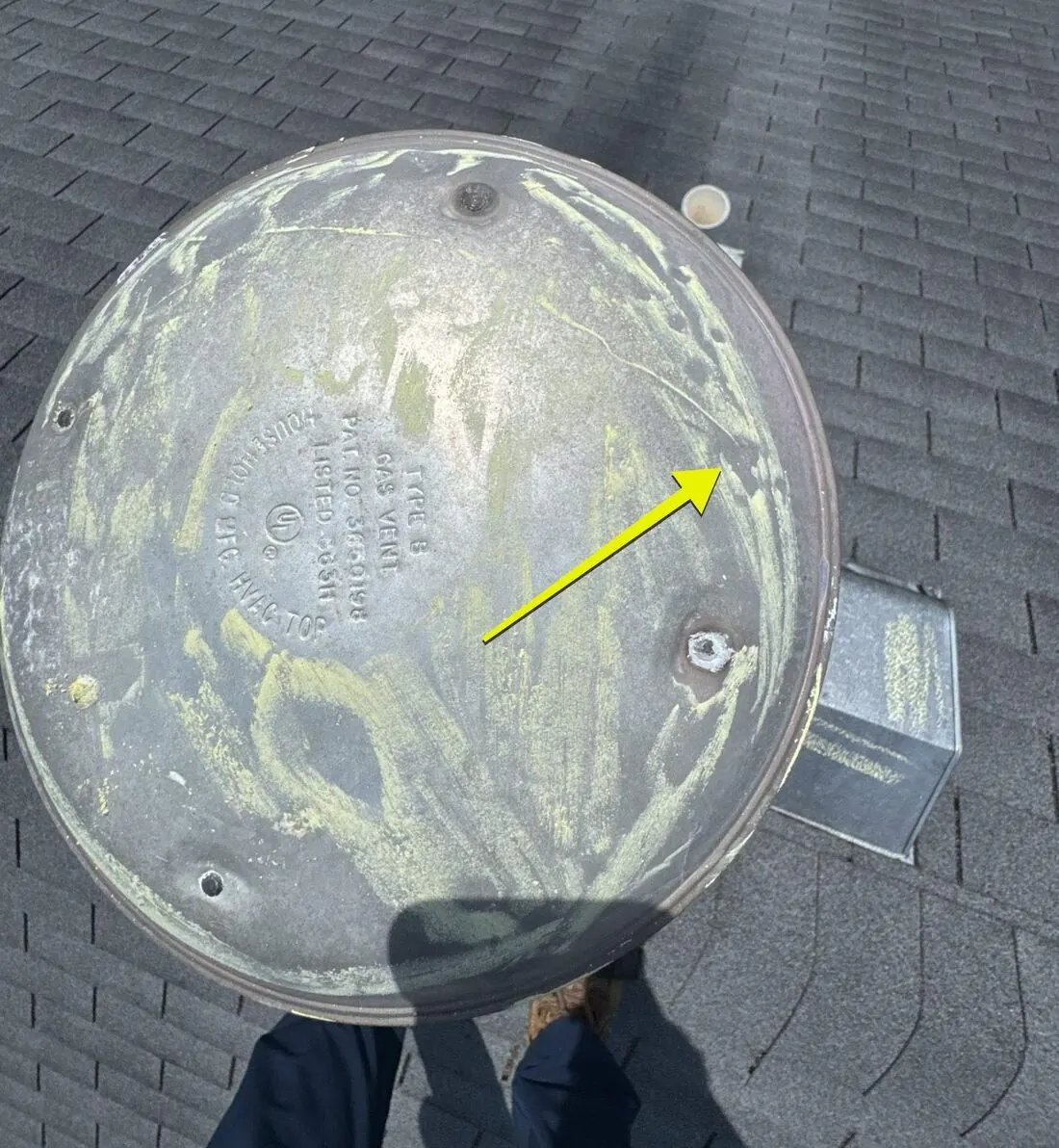 Roof vents: Hail dents across a vent cap
